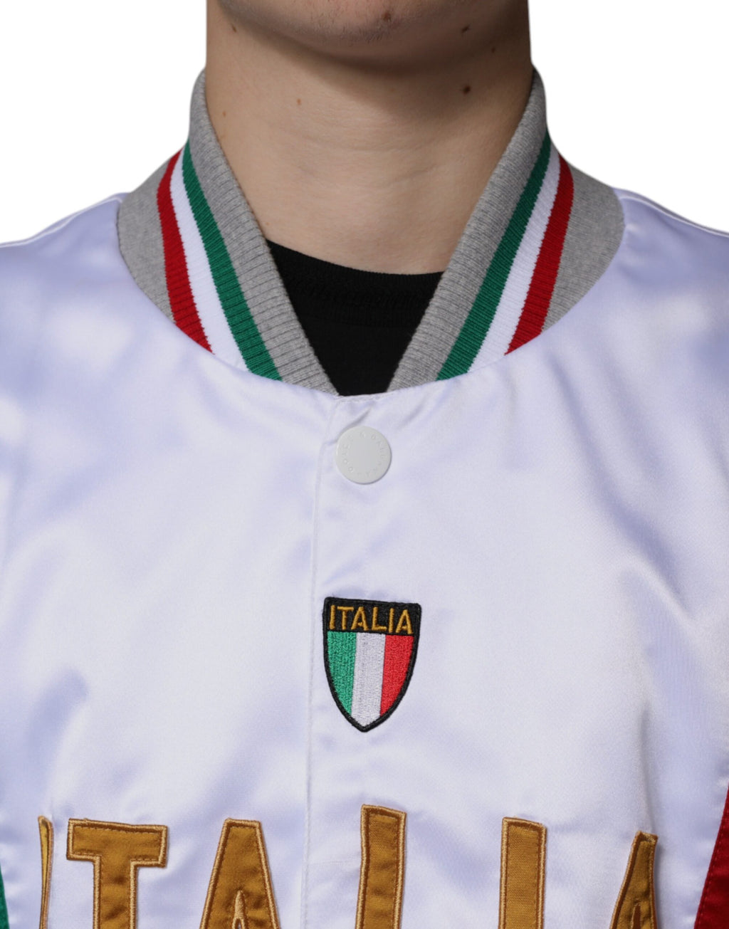 Veste bomber multicolore Dolce & Gabbana Italia avec boutons, style décontracté et détails colorés visibles sur l'image.
