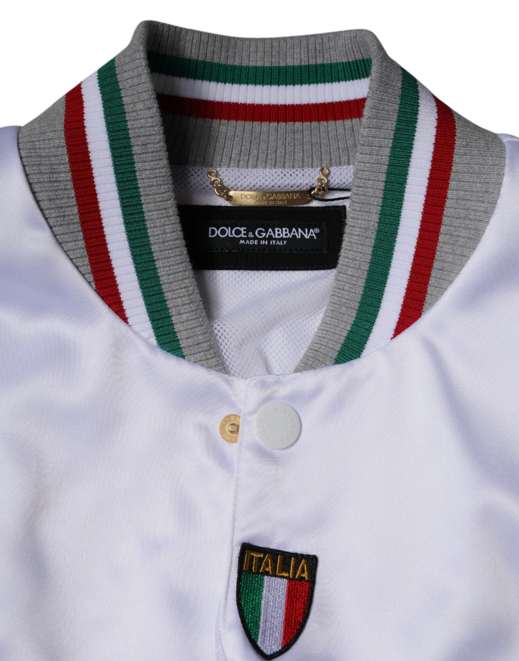 Veste bomber Dolce & Gabbana à boutons multicolores, motif Italie, style décontracté et élégant, vue de face.