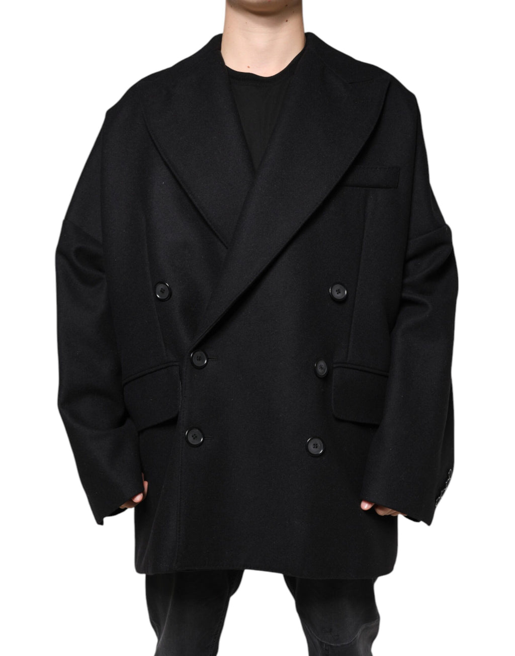 Manteau homme Dolce & Gabbana en laine noire, à double boutonnage et coupe élégante, visible sur l'image.