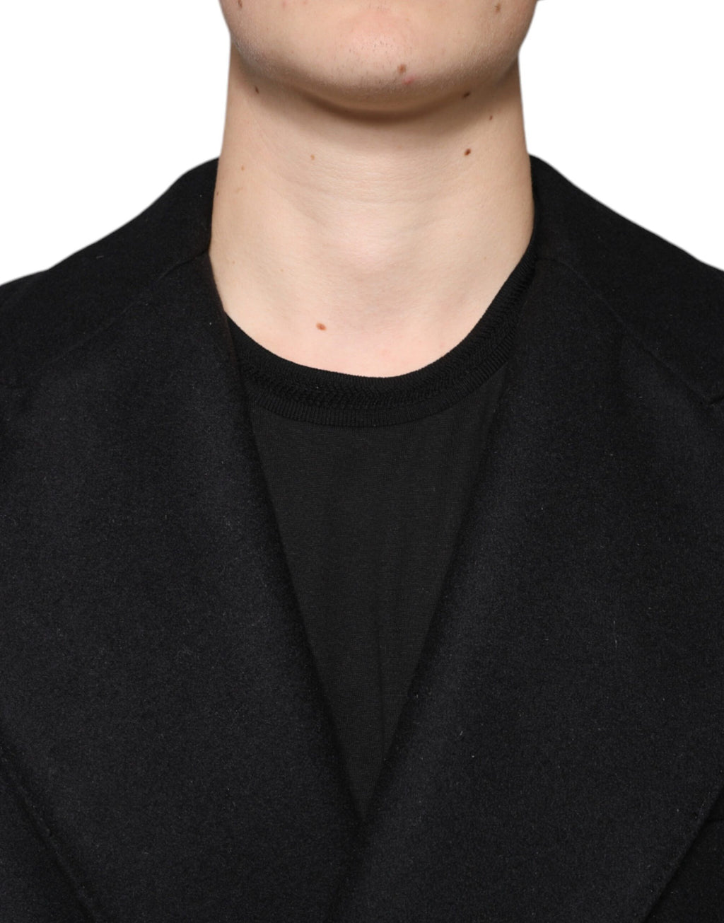 Manteau homme noir en laine double boutonnage de Dolce & Gabbana, veste élégante et chic, visible en détail sur l'image.