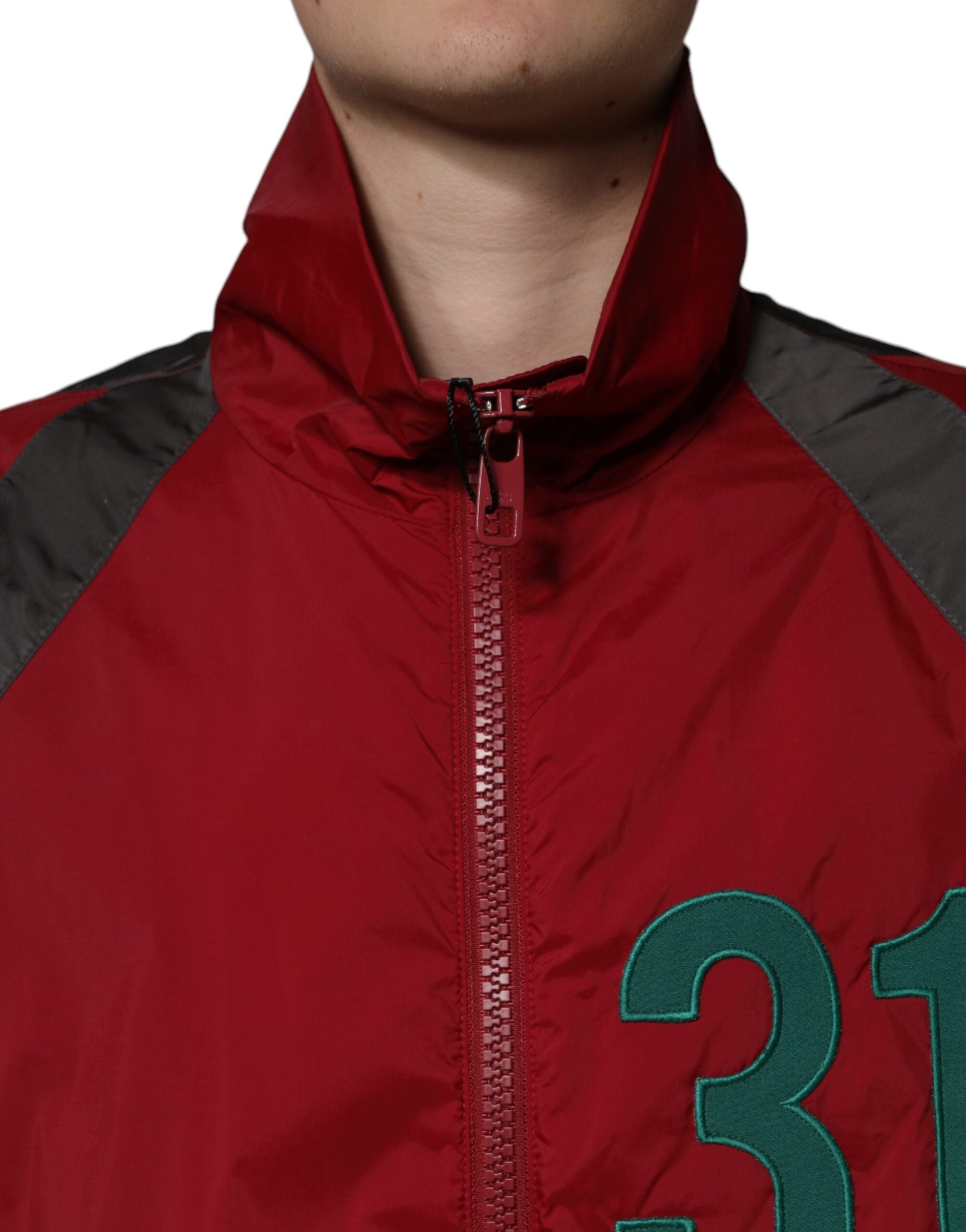 Veste coupe-vent en nylon multicolore Dolce & Gabbana avec fermeture éclair intégrale, style moderne et coloré.