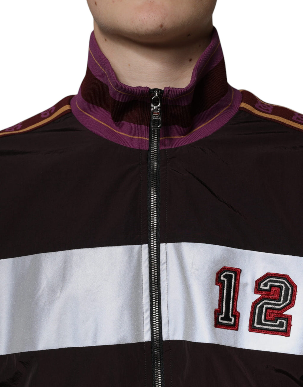 Veste bomber pour homme Dolce & Gabbana en jersey multicolore avec fermeture éclair complète, style moderne et élégant.