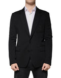 Blazer formel en laine noire Dolce & Gabbana à simple boutonnage, élégant et sophistiqué pour occasions habillées.