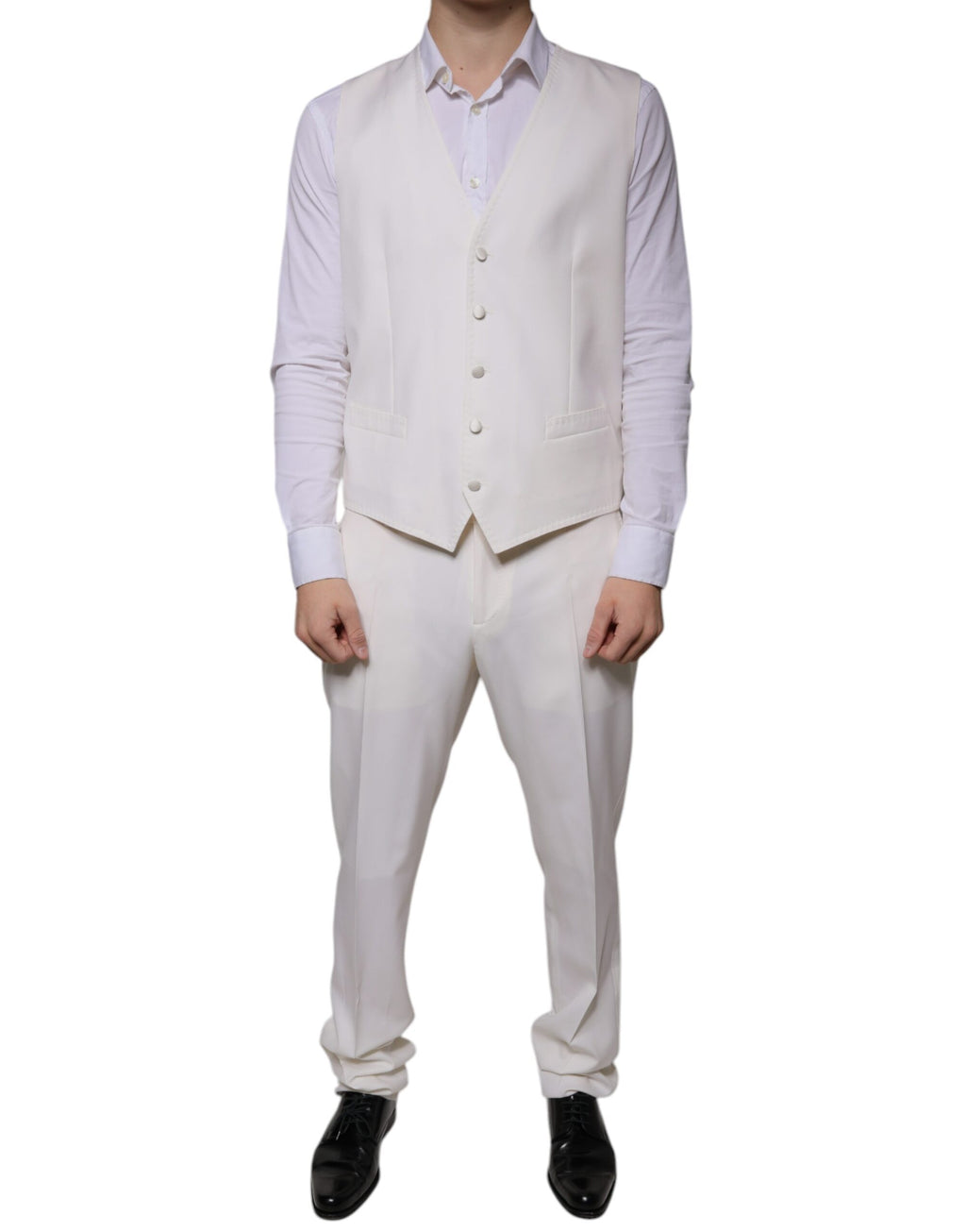 Costume formel blanc en laine et soie de Dolce & Gabbana, costume trois pièces ajusté pour homme.
