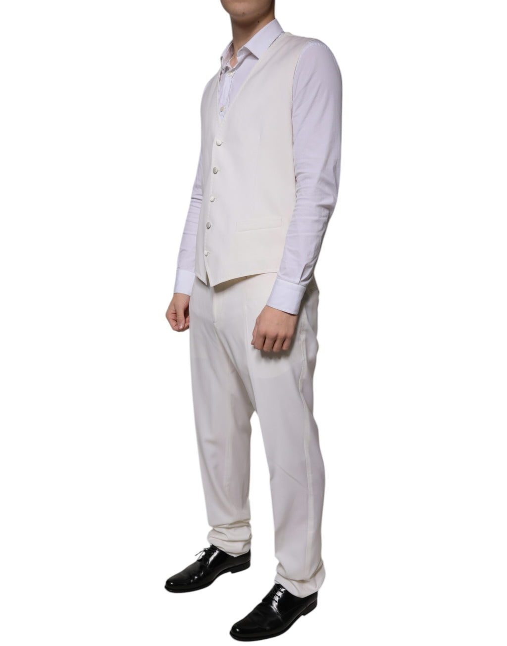 Costume formel blanc en laine et soie Dolce & Gabbana, costume trois pièces slim fit avec veste, pantalon et gilet.