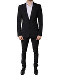 Costume homme noir en laine Dolce & Gabbana, costume trois pièces slim fit formel avec veste, pantalon et gilet élégants.