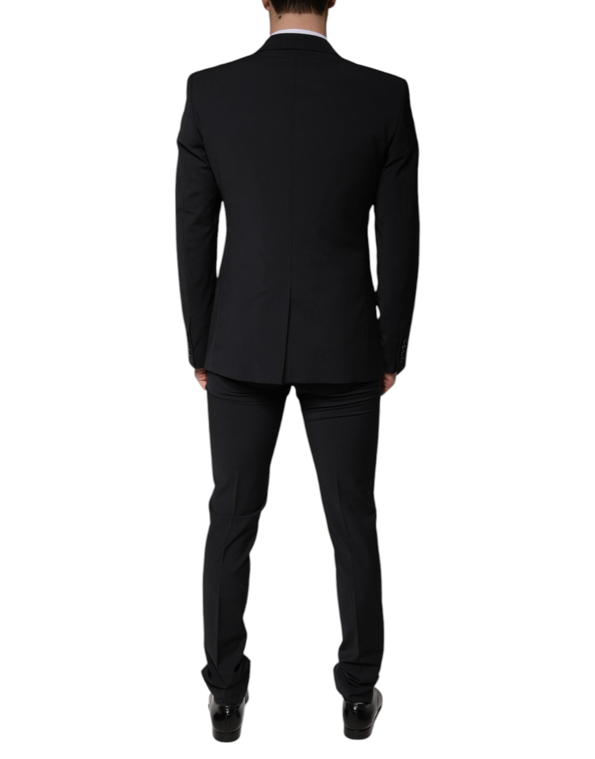 Costume homme noir en laine Dolce & Gabbana, costume trois pièces ajusté pour occasions formelles, élégant et sophistiqué.