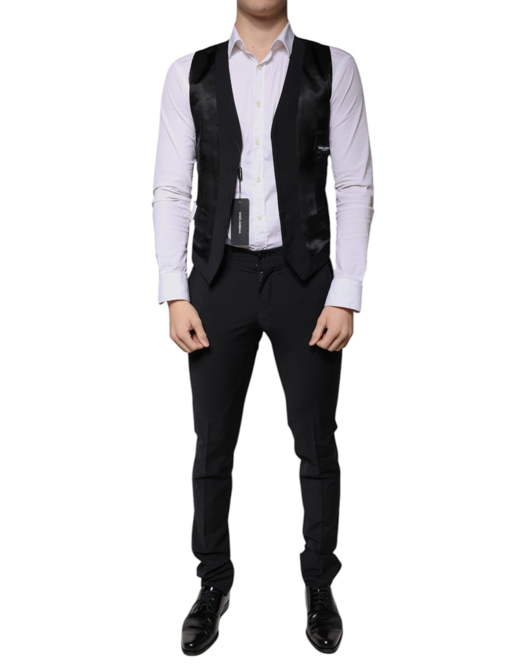 Costume homme noir en laine Dolce & Gabbana, costume trois pièces slim fit formel, vue de face.