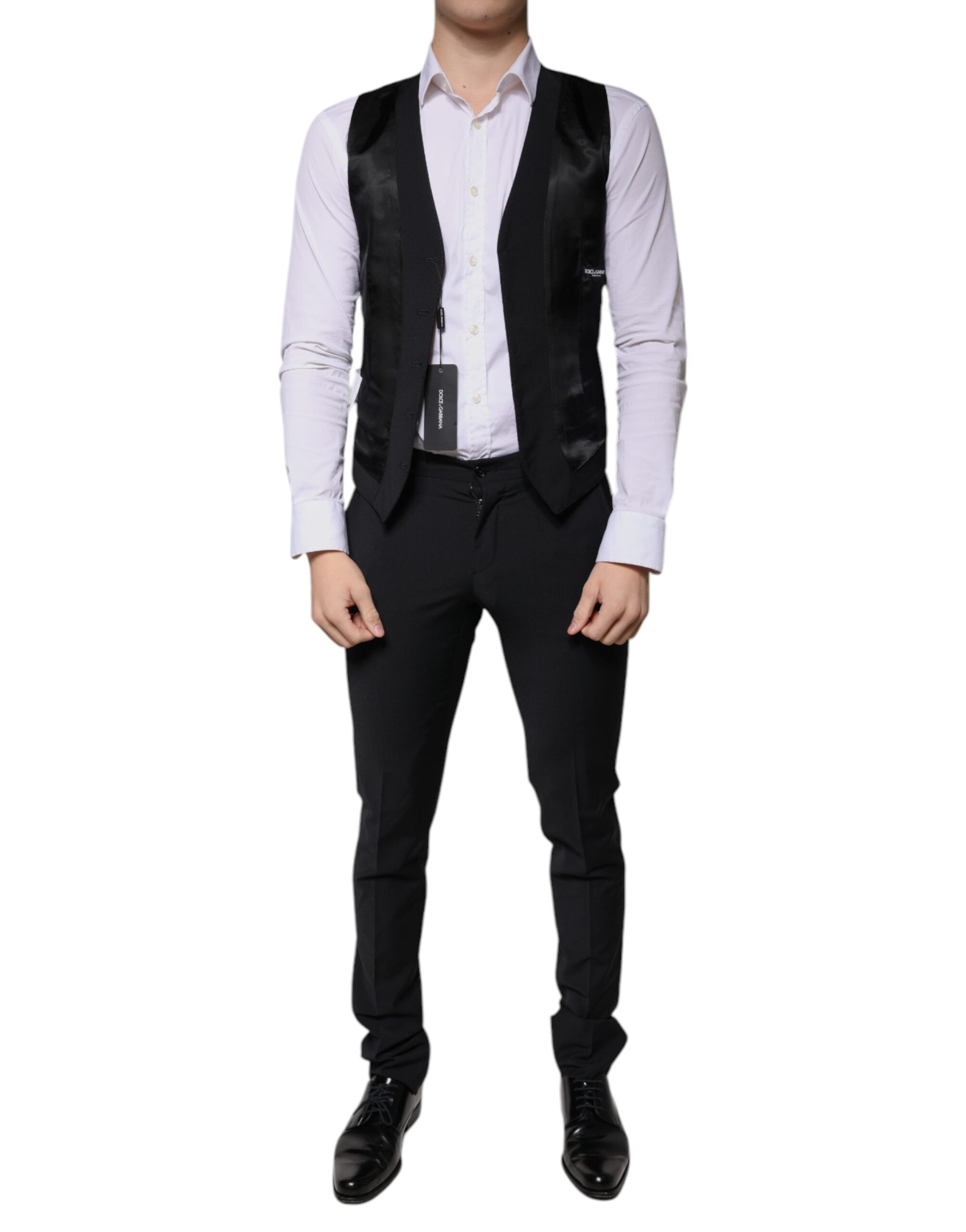 Costume homme noir en laine Dolce & Gabbana, costume trois pièces slim fit formel, vue de face.