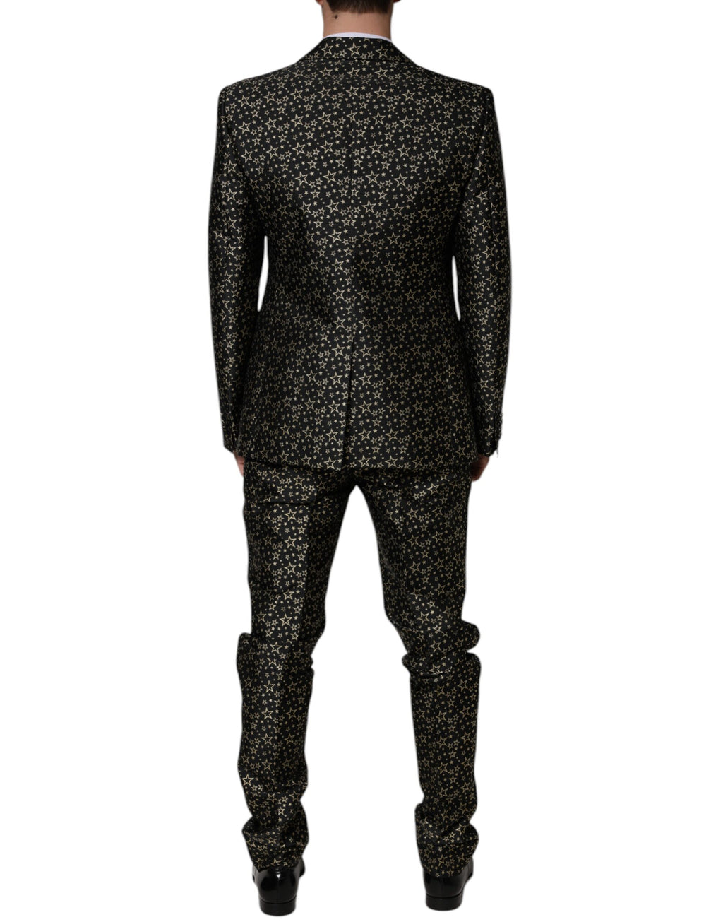 Costume deux pièces Dolce & Gabbana Sicilia en jacquard noir avec motifs étoiles, veste et pantalon élégants.