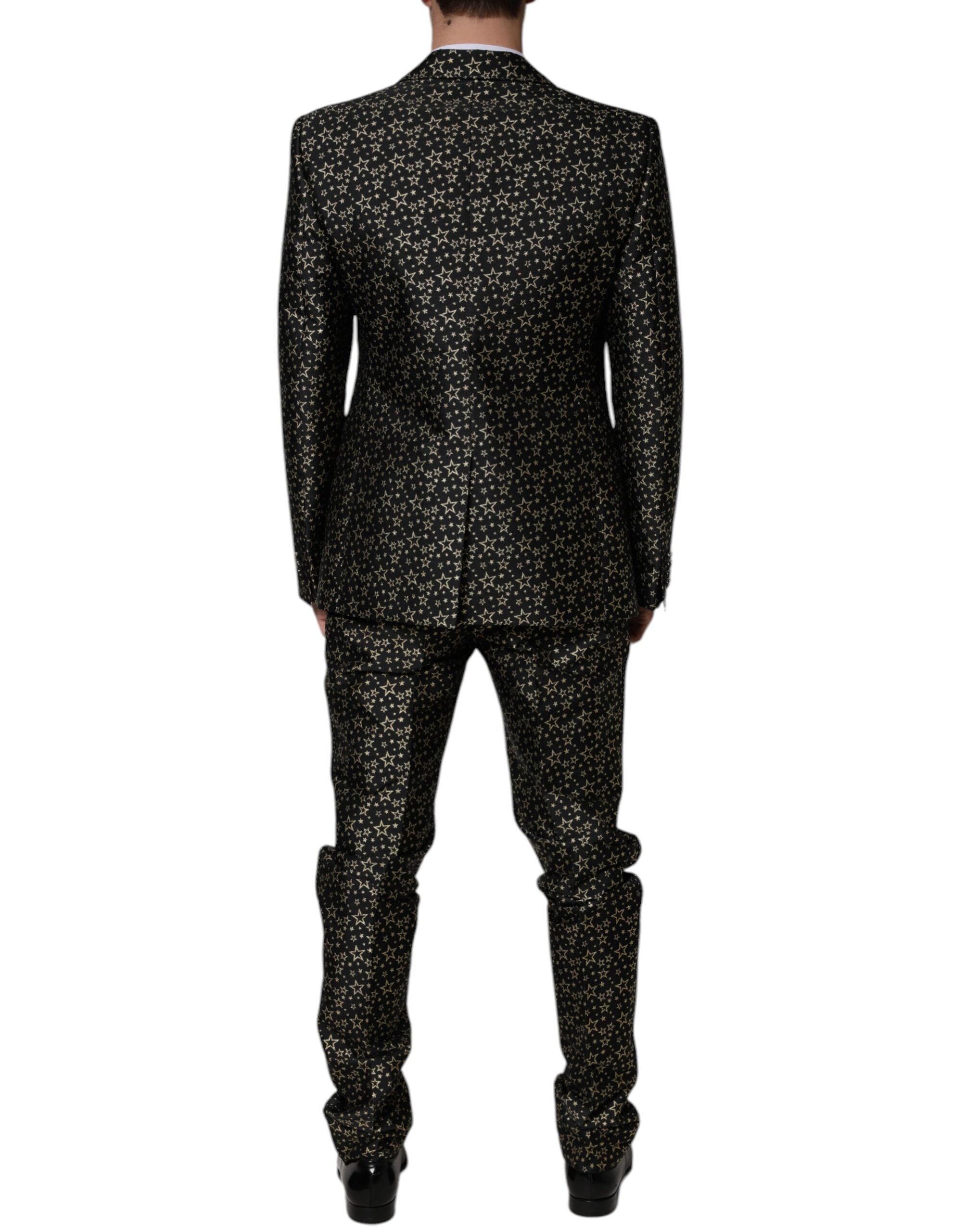 Costume deux pièces Dolce & Gabbana Sicilia en jacquard noir avec motifs étoiles, veste et pantalon élégants.
