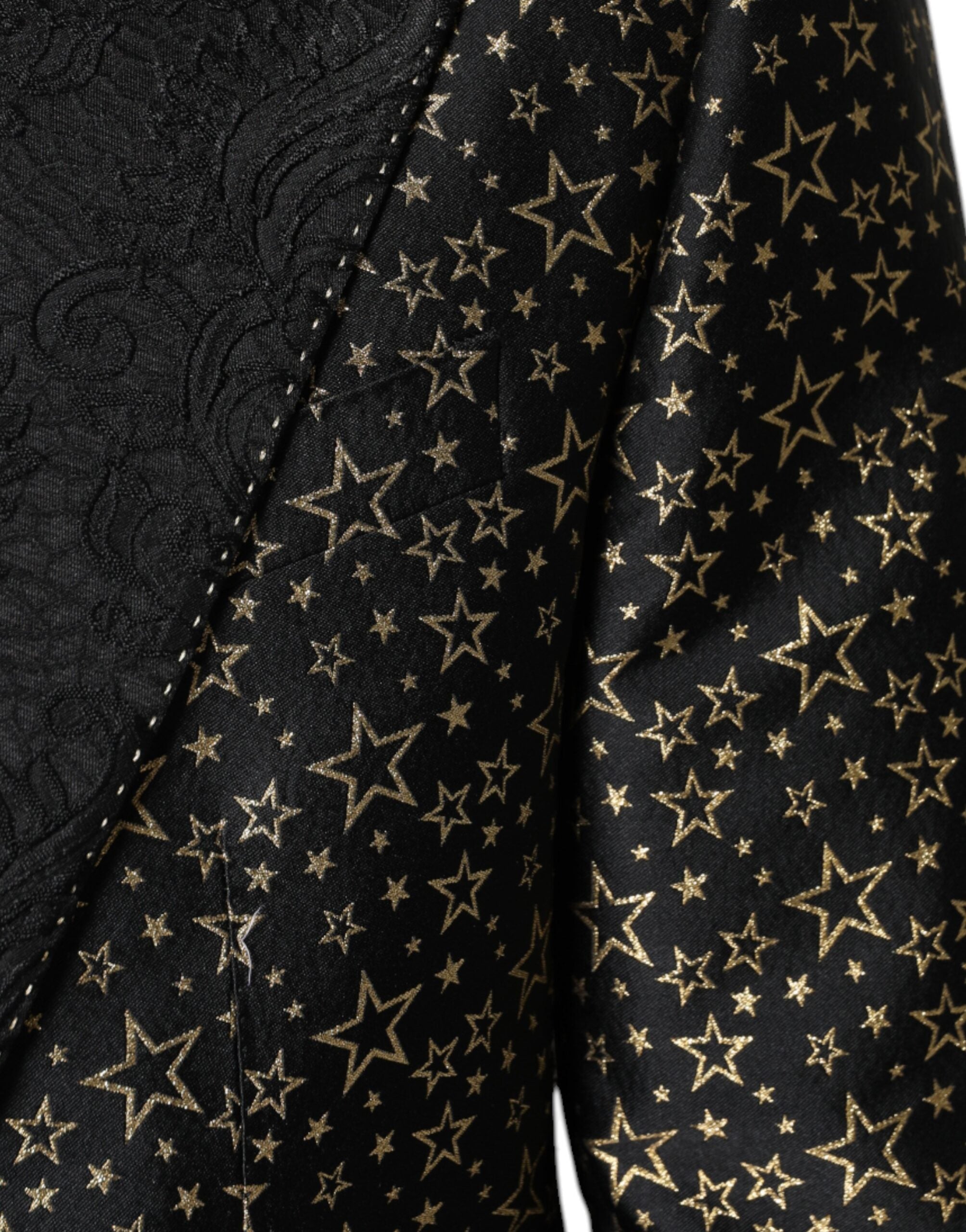 Costume deux pièces Dolce & Gabbana en jacquard noir avec motifs étoiles, style Sicilia, vue de face.