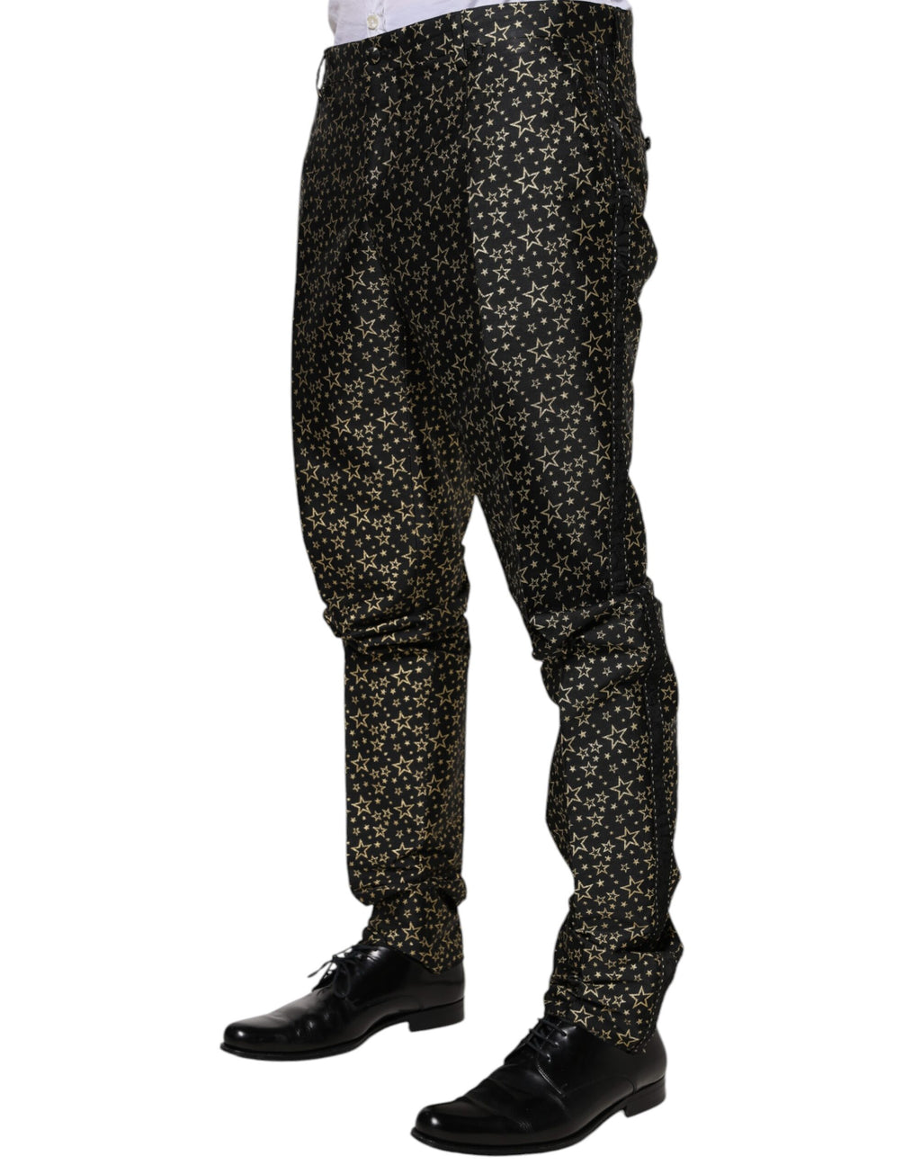 Costume deux pièces Dolce & Gabbana en jacquard noir avec motifs étoiles, style Sicilia élégant et moderne.