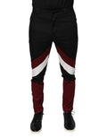 Pantalons skinny en coton à rayures multicolores de Dolce & Gabbana, style élégant et moderne.