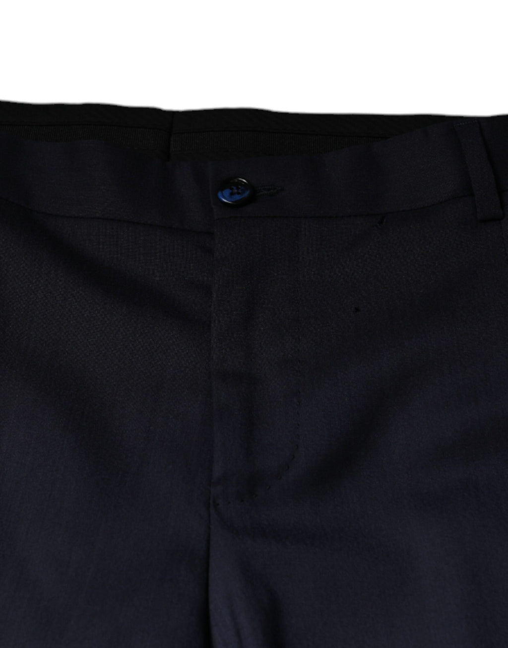 Pantalon formel en laine bleue Dolce & Gabbana, coupe skinny, adapté pour occasions élégantes et professionnelles.