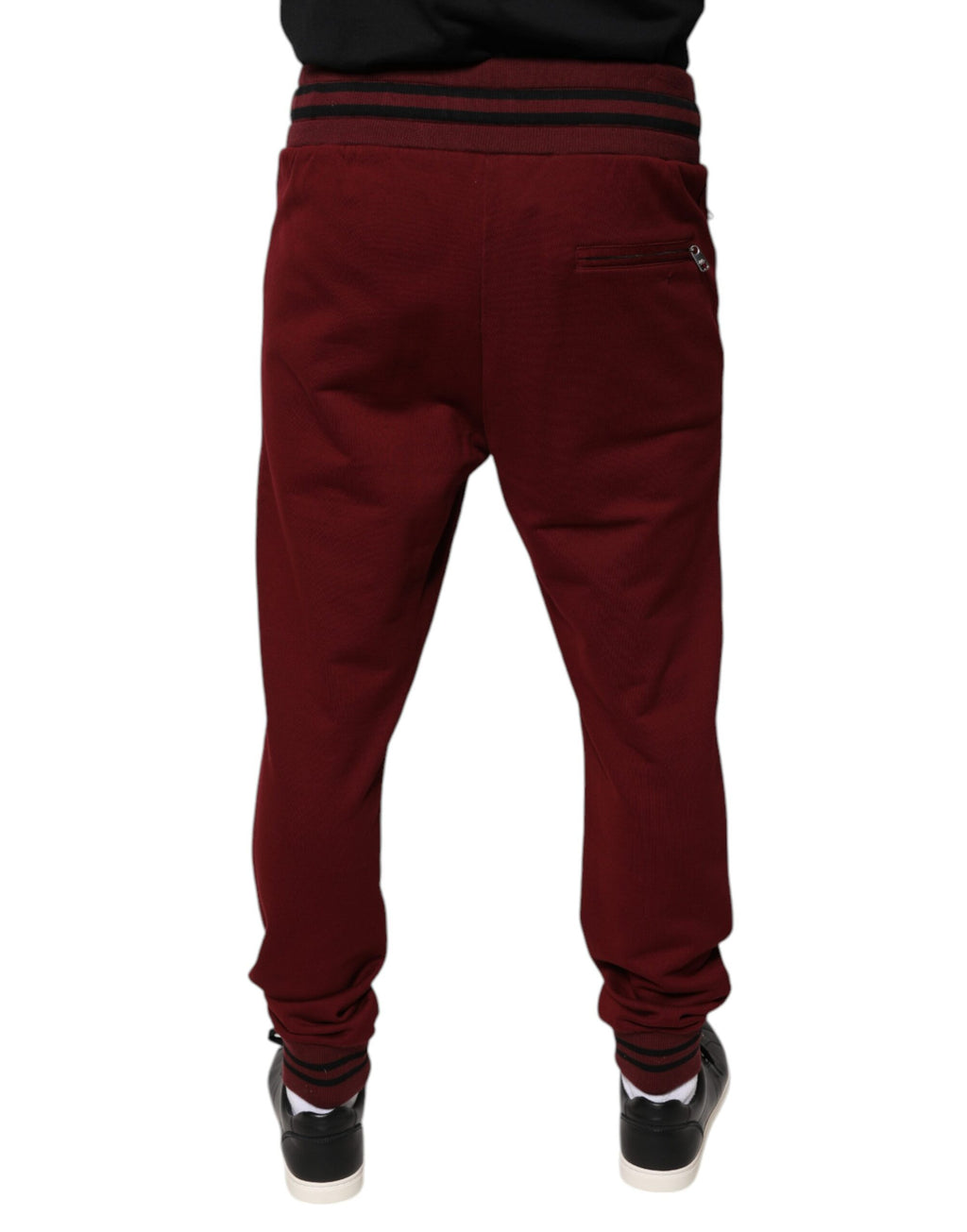 Pantalon de jogging pour homme Dolce & Gabbana en coton rouge foncé, style décontracté avec poches et taille élastique.