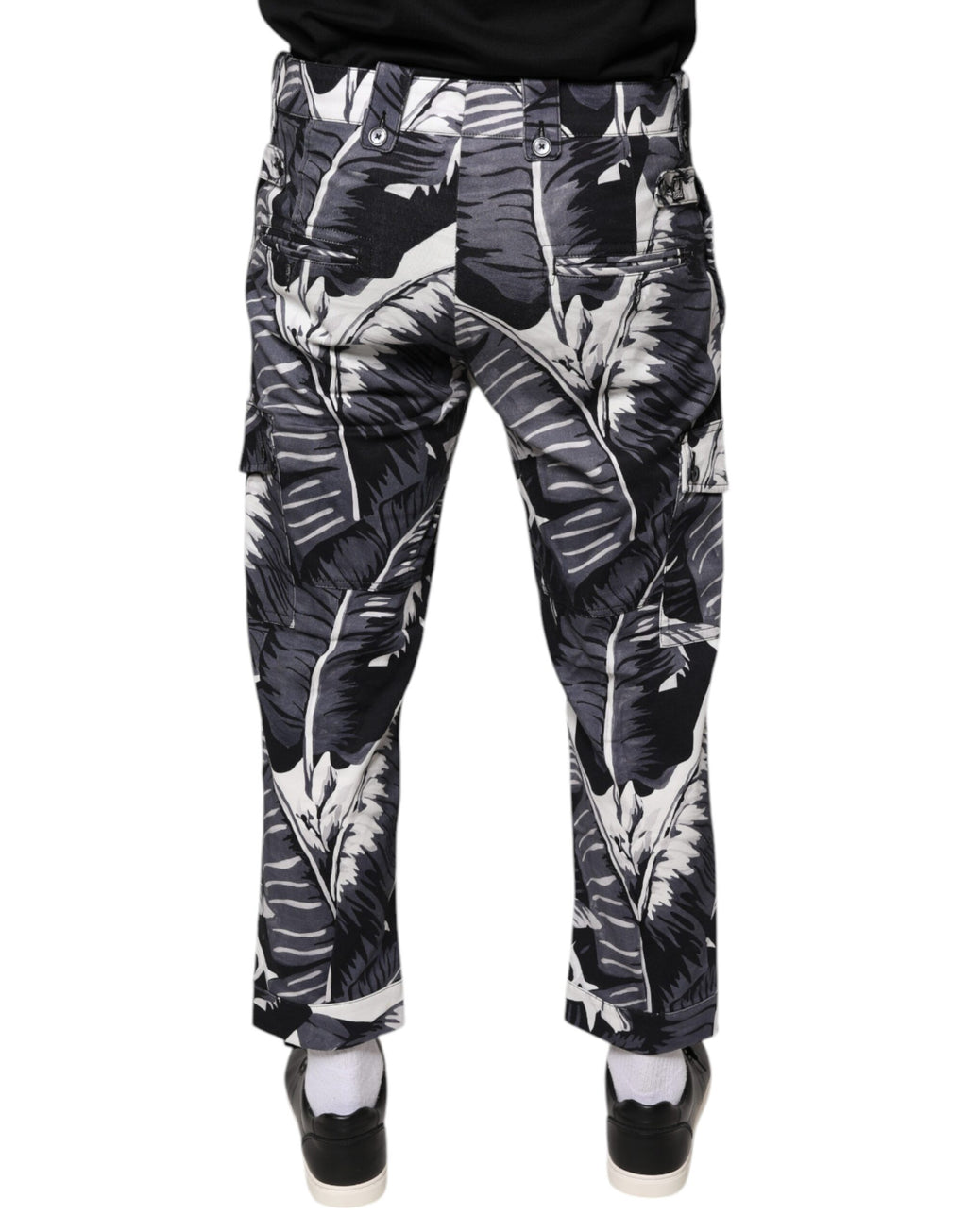 Pantalons Capri en coton stretch gris à motif banane de Dolce & Gabbana, détails visibles sur le tissu.