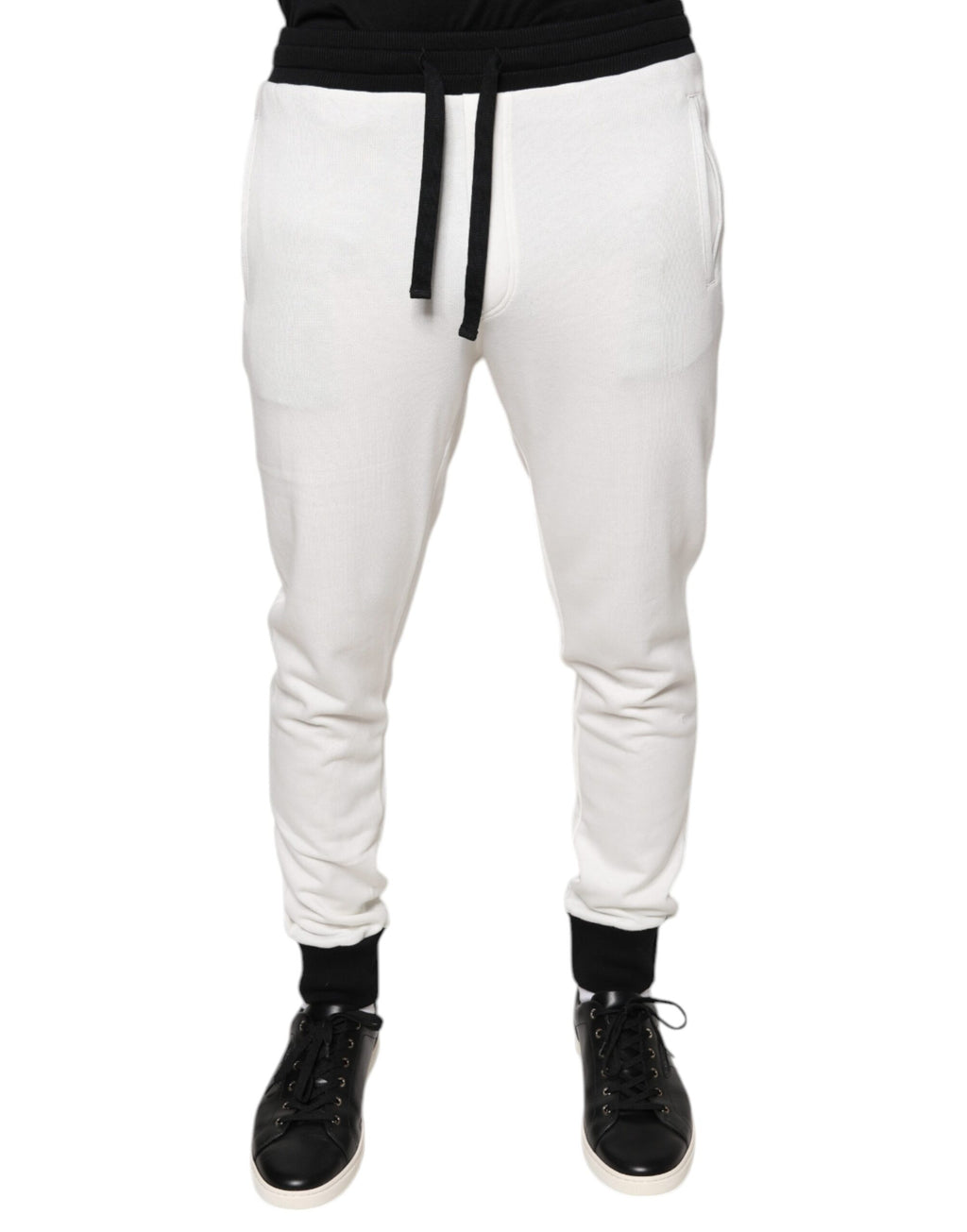 Pantalon de jogging blanc en coton pour homme de la marque Dolce & Gabbana, coupe slim et confortable.
