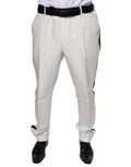 Pantalons de costume en polyester blanc Dolce & Gabbana pour femme, style élégant et sophistiqué, visibles en gros plan.