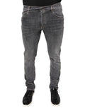 Jeans skinny en denim extensible gris foncé Dolce & Gabbana, coupe ajustée, en coton, visible sur un mannequin.