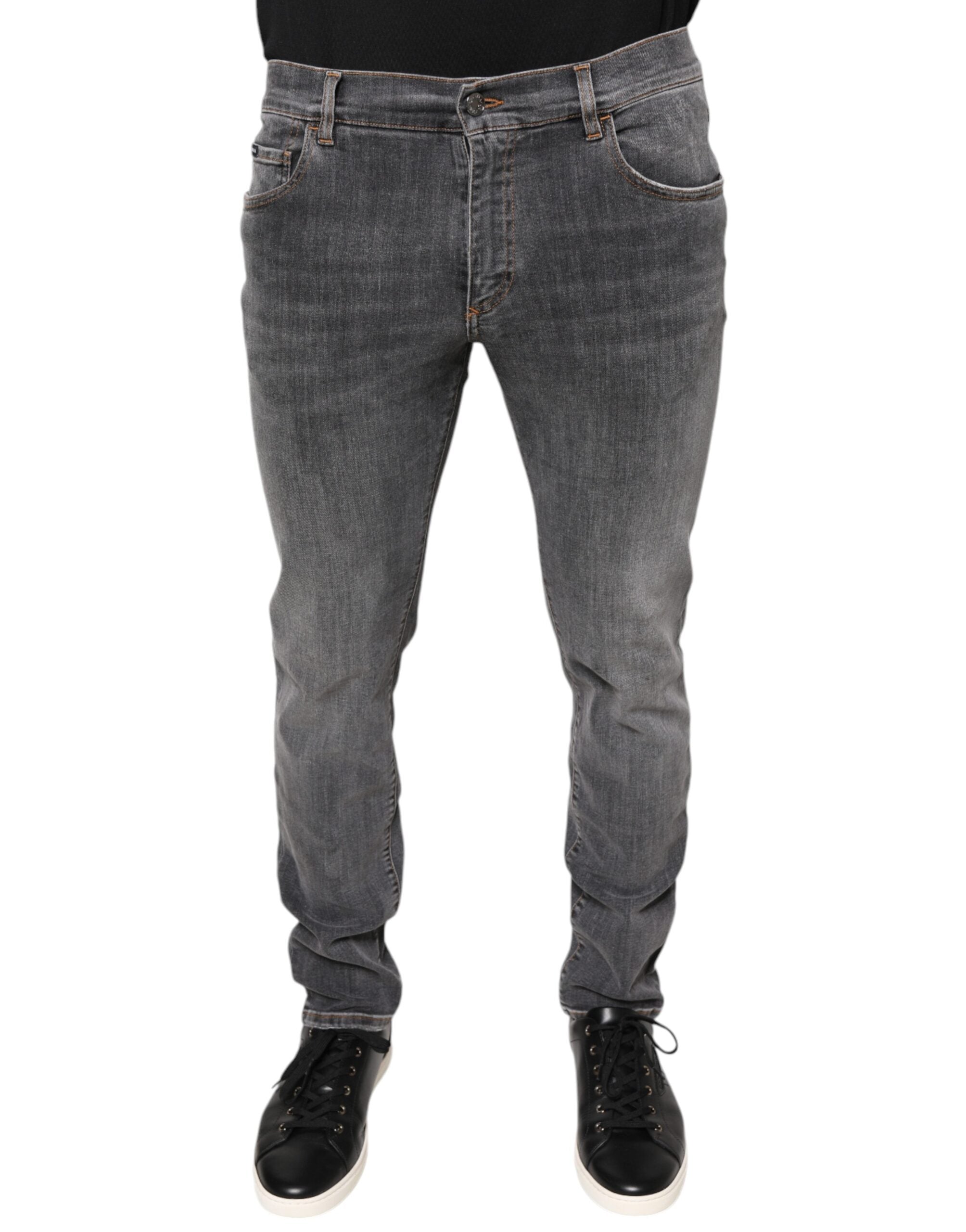 Jeans skinny en denim extensible gris foncé Dolce & Gabbana, coupe ajustée, en coton, visible sur un mannequin.