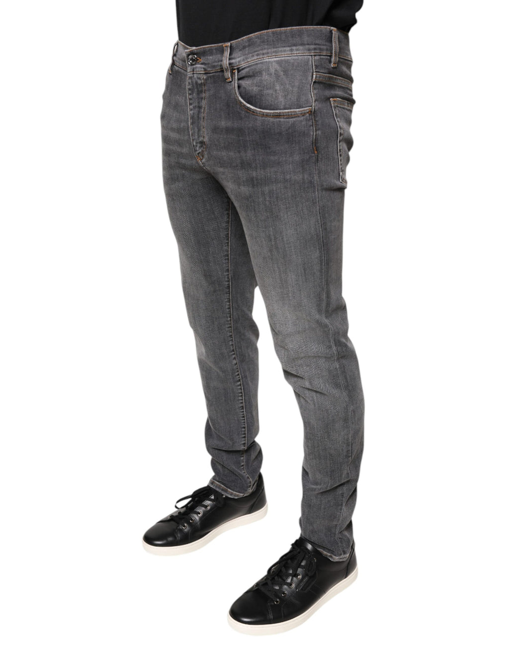 Jeans skinny en denim coton stretch gris foncé de Dolce & Gabbana, affichant une coupe ajustée et des détails modernes.