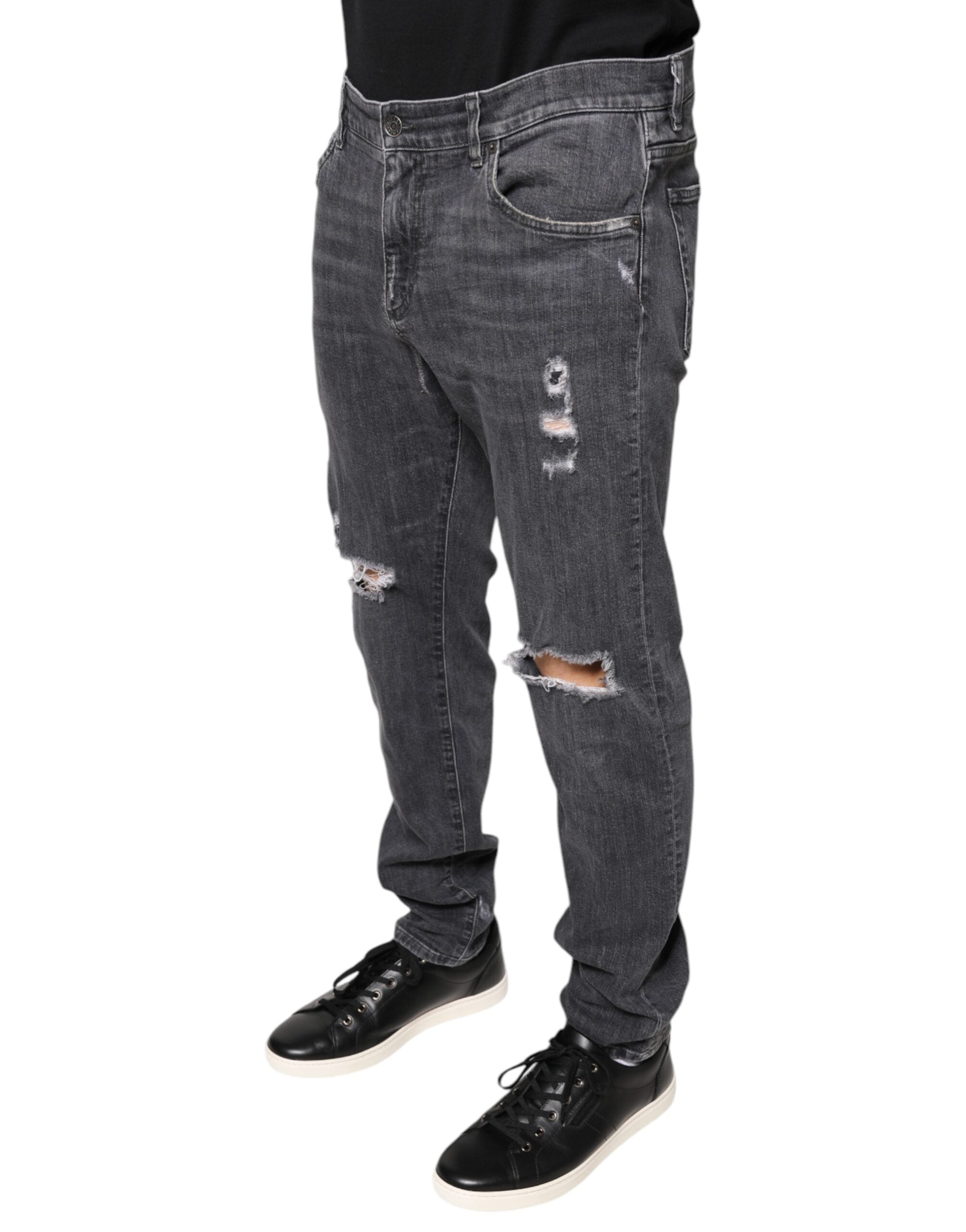Jeans slim en denim de coton gris foncé déchiré de Dolce & Gabbana, style tattered et ajusté.