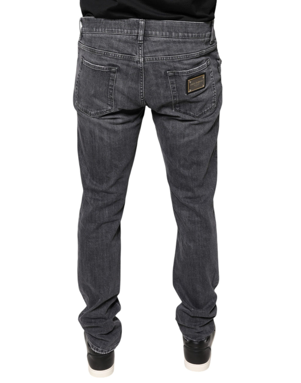 Jeans slim en denim coton gris foncé déchiré de Dolce & Gabbana, coupe skinny, détails usés et déchirés visibles.