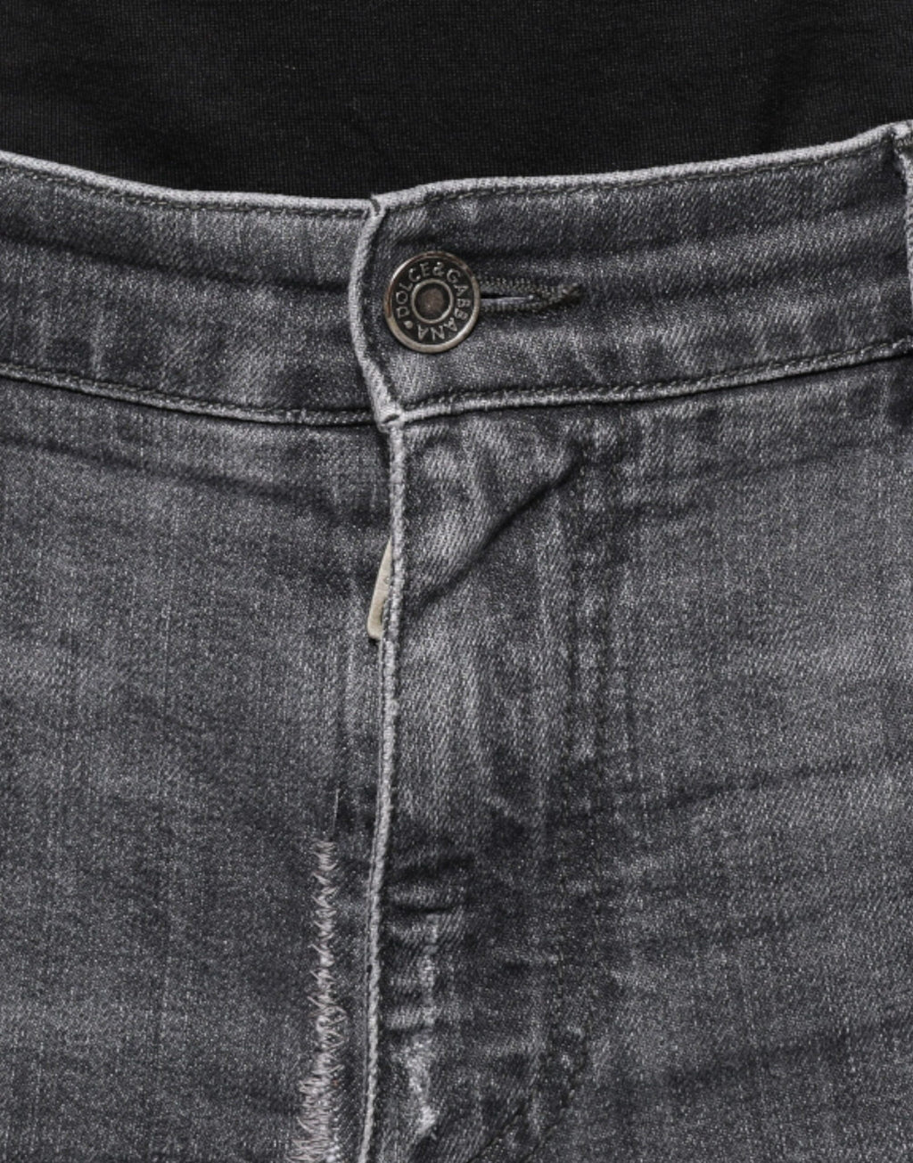 Jeans skinny en coton déchiré gris foncé de Dolce & Gabbana, style décontracté avec détails usés visibles.