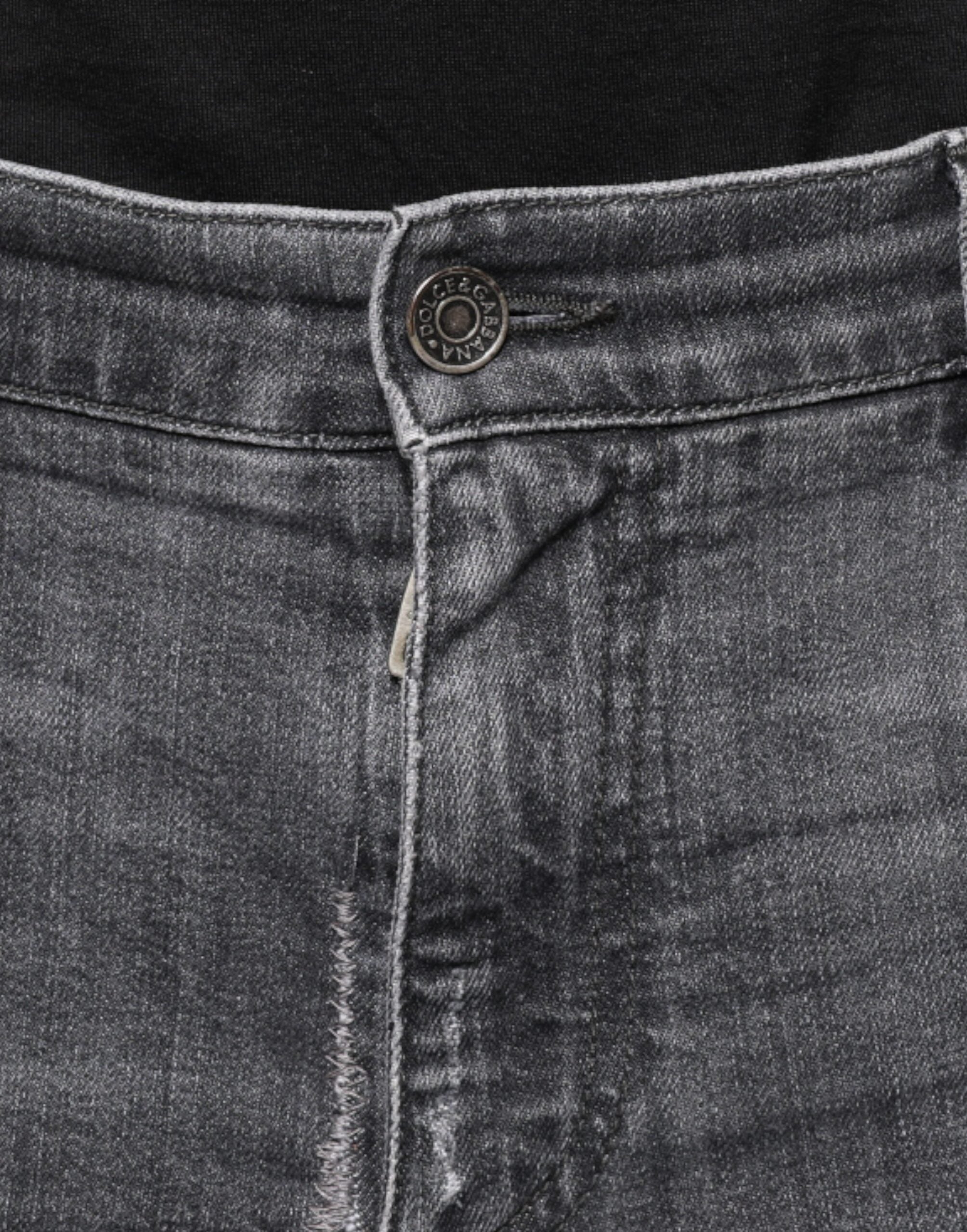 Jeans skinny en coton déchiré gris foncé de Dolce & Gabbana, style décontracté avec détails usés visibles.