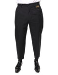 Pantalon en coton noir Dolce & Gabbana avec motif de couronne, pantalon élégant pour femme, vue de face sur modèle.