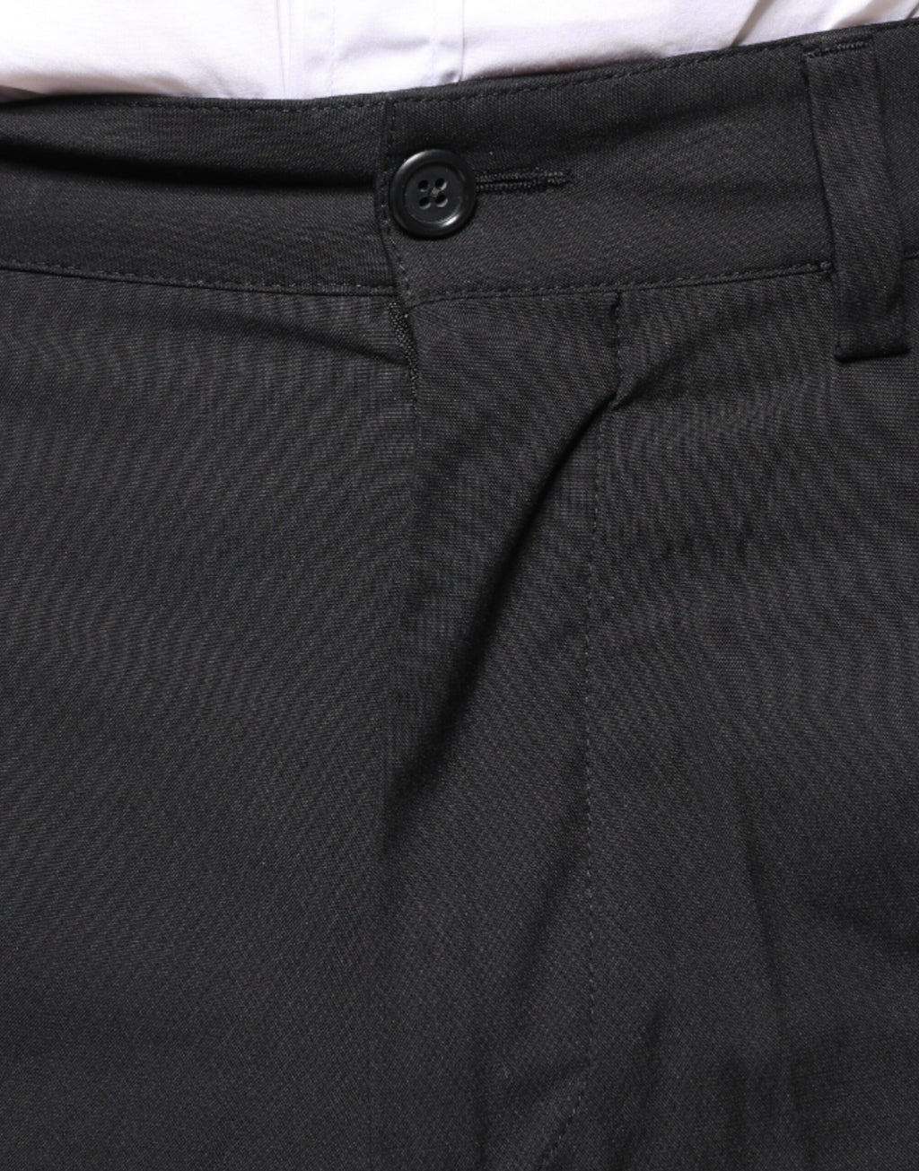 Pantalon en coton noir Dolce & Gabbana avec motif de couronne, style élégant et moderne.