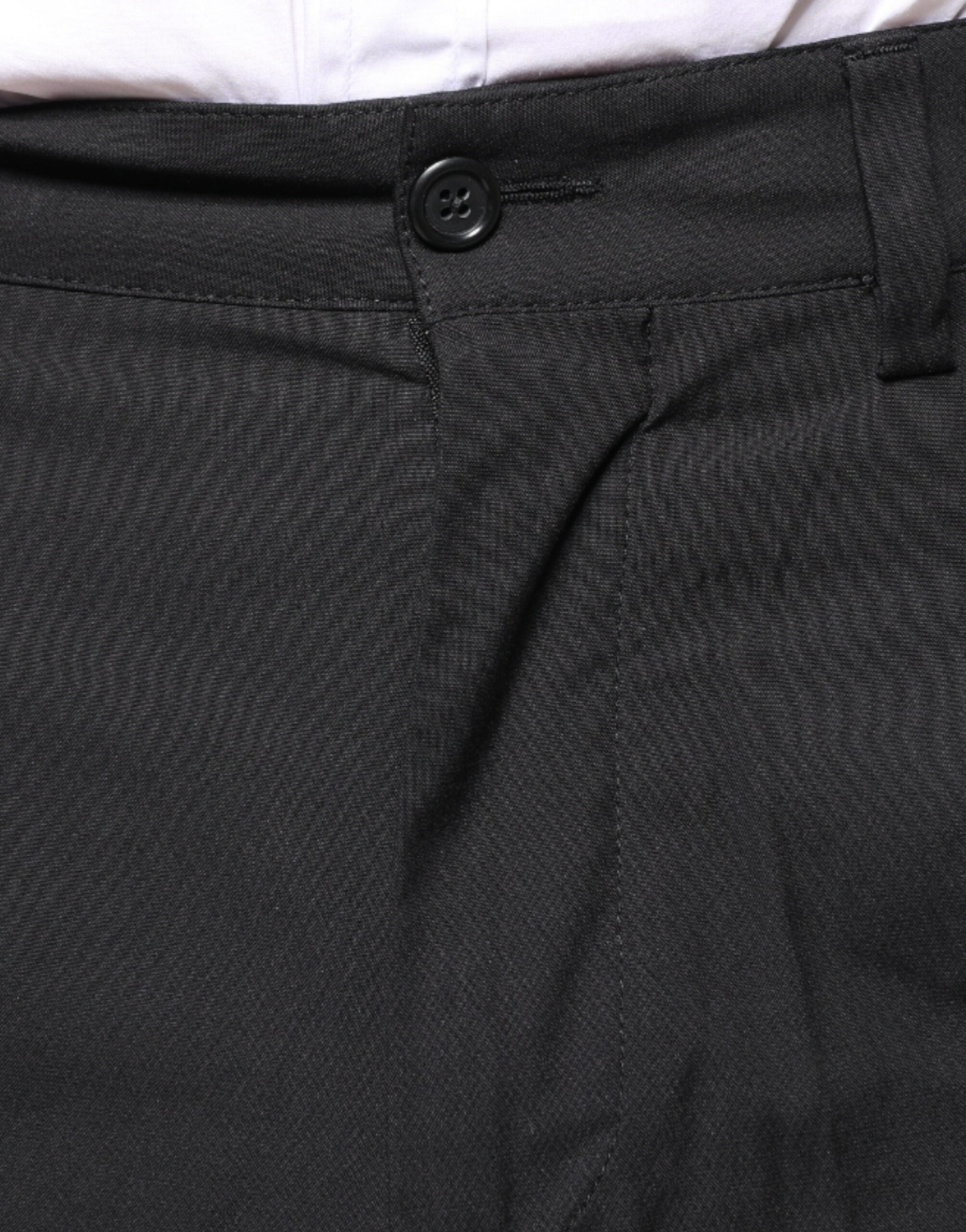 Pantalon en coton noir Dolce & Gabbana avec motif de couronne, style élégant et moderne.