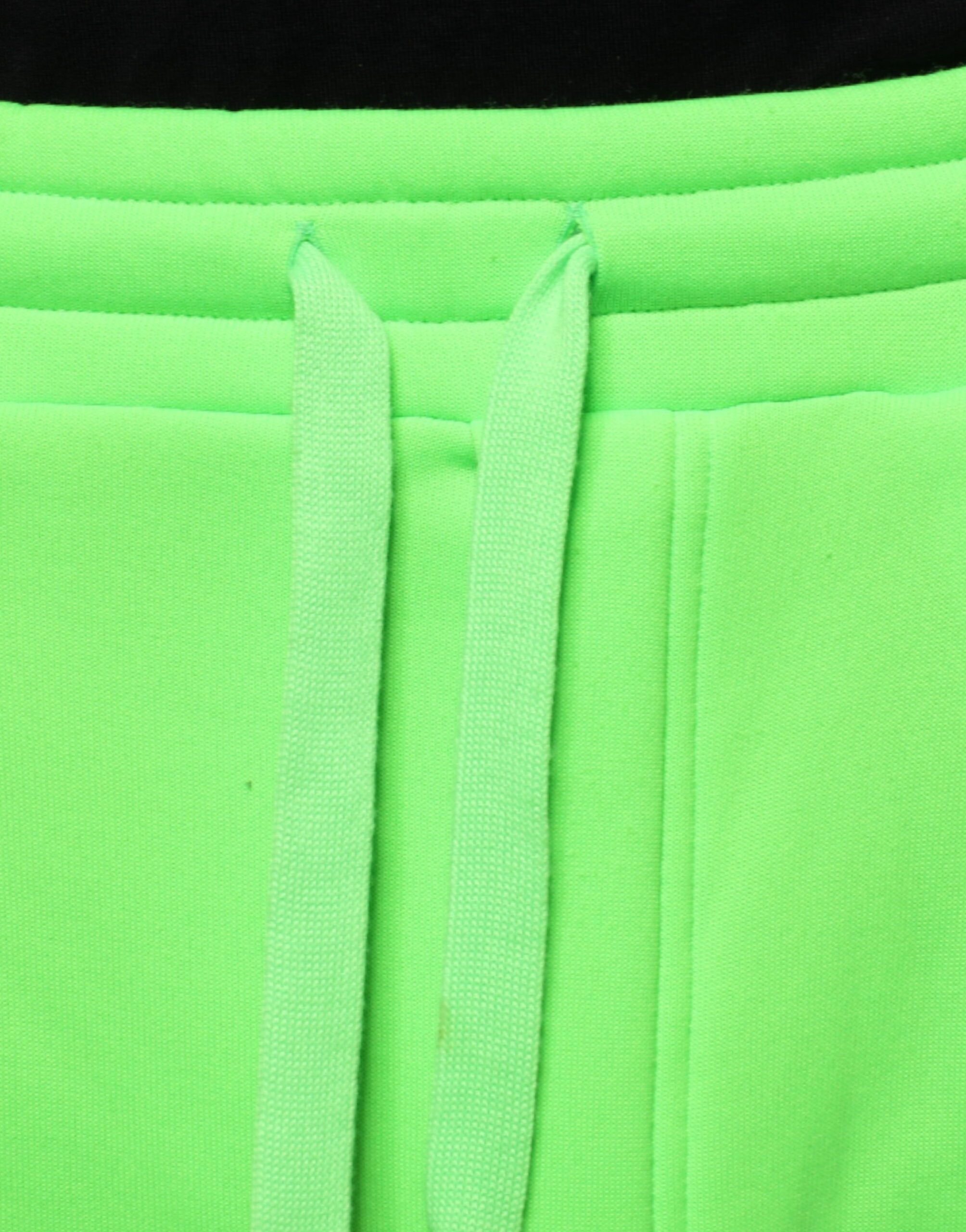 Pantalon cargo jogging en polyester vert néon de Dolce & Gabbana, style décontracté avec poches et taille elastiquée.