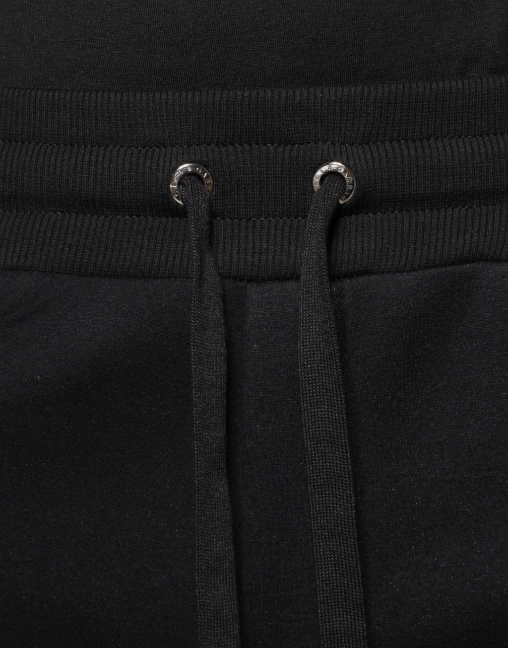 Pantalon de jogging noir Dolce & Gabbana en modal avec logo DG, pour homme, vêtement décontracté et confortable.