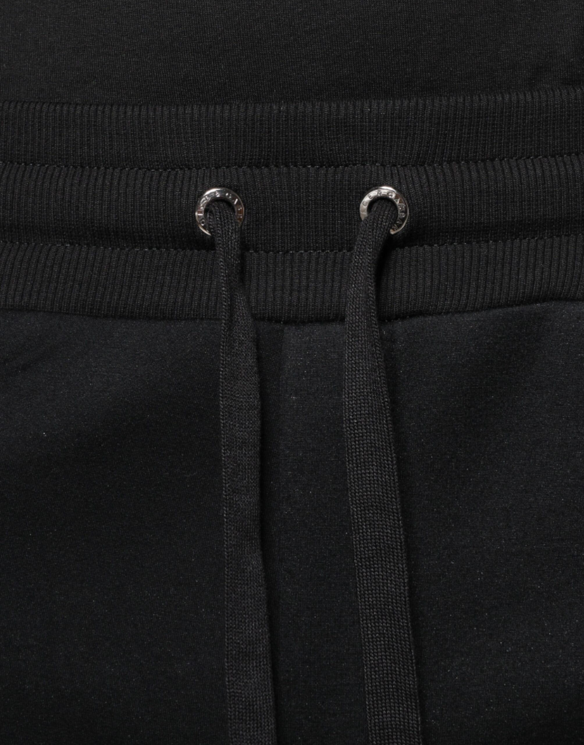 Pantalon de jogging noir Dolce & Gabbana en modal avec logo DG, pour homme, vêtement décontracté et confortable.