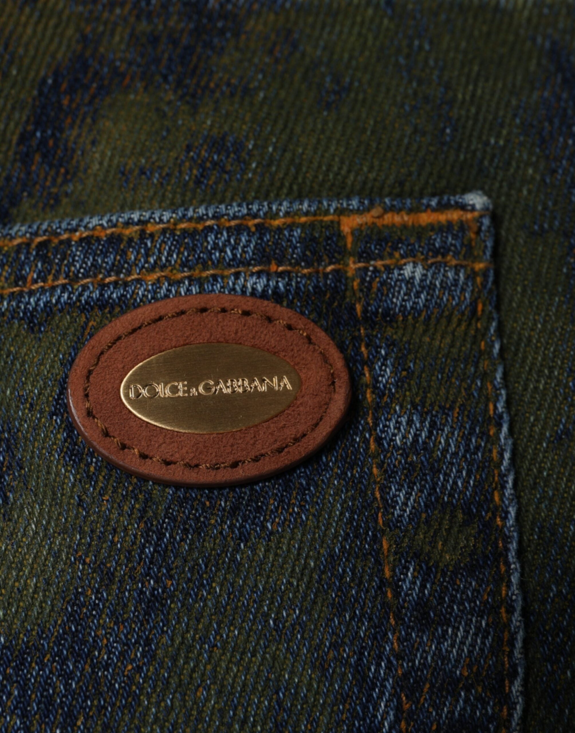 Jeans homme Slim Fit en coton teint bleu de Dolce & Gabbana, denim élégant avec coupe ajustée.