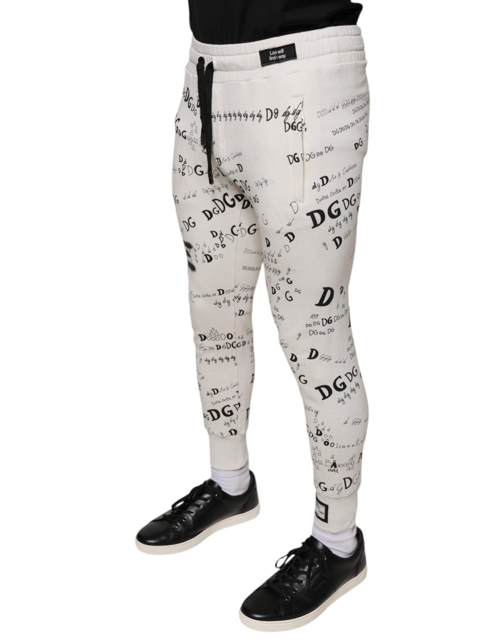 Pantalons joggers en coton blanc imprimé de Dolce & Gabbana, style décontracté avec la marque élégante visible.