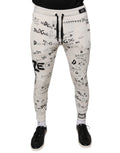 Pantalon de jogging en coton blanc imprimé Dolce & Gabbana, style décontracté avec ceinture élastique et poches latérales.