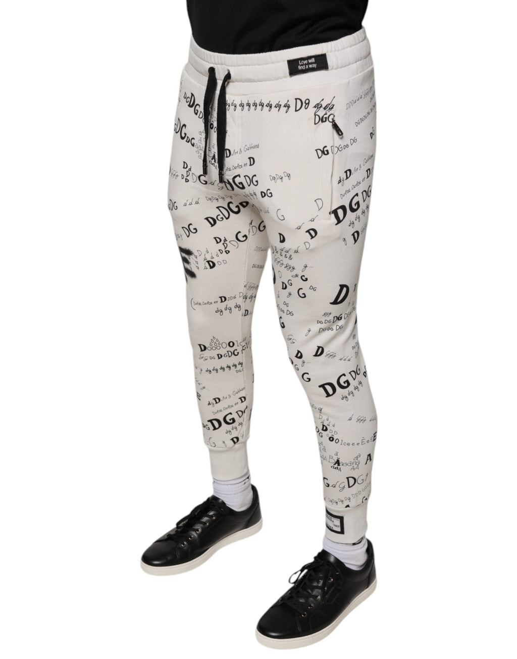 Pantalon jogging blanc en coton imprimé de Dolce & Gabbana, style décontracté avec ceinture élastique et poches latérales.