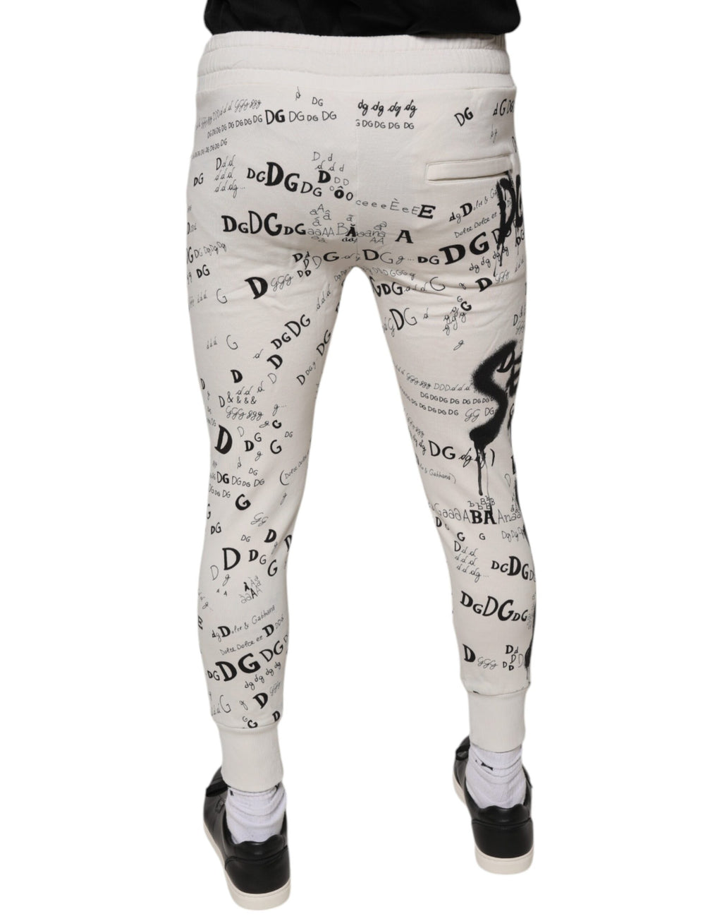 Pantalons de jogging en coton blanc imprimé de Dolce & Gabbana, style confortable et décontracté, vue de face.