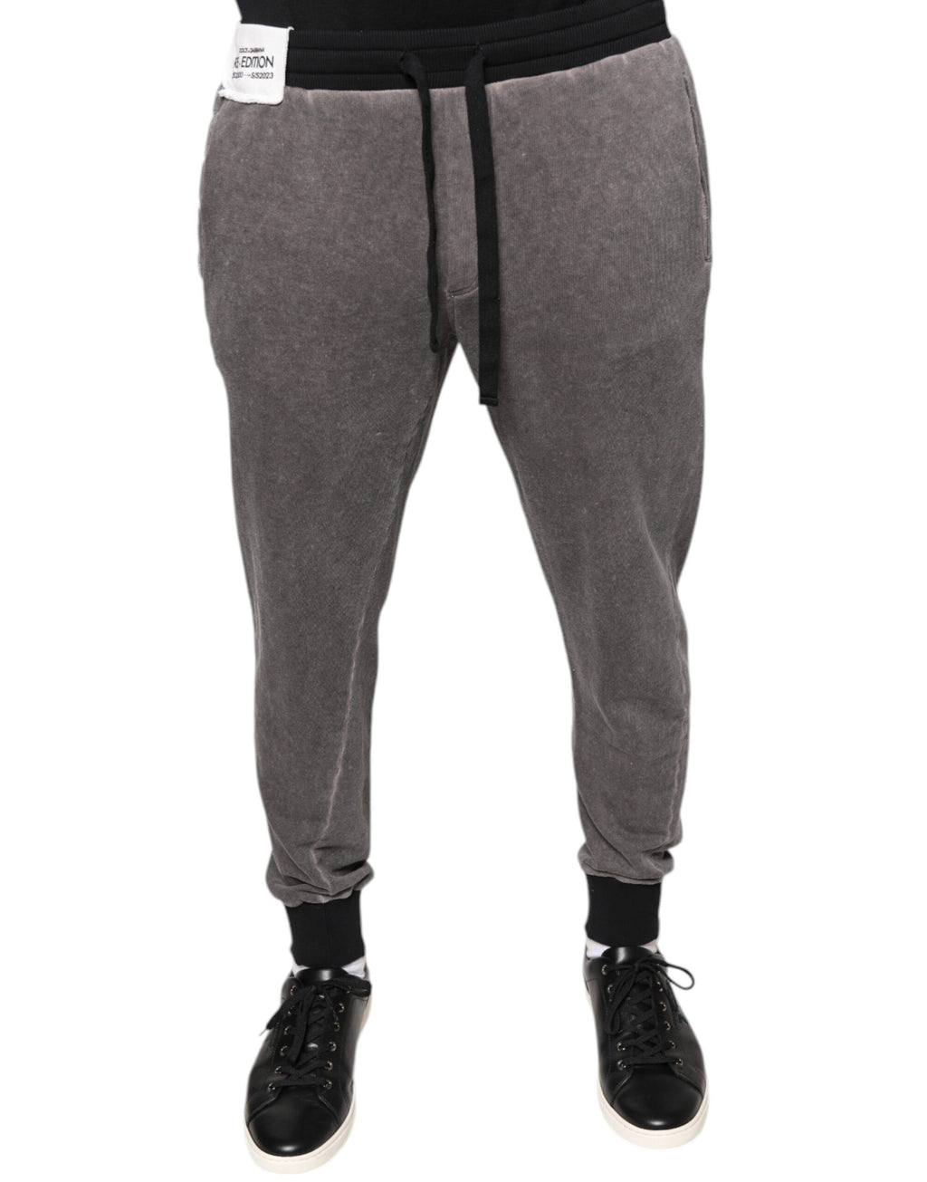 Pantalon de jogging gris en coton Dolce & Gabbana, style décontracté avec ceinture élastique et poches latérales.