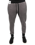 Pantalon de jogging gris en coton Dolce & Gabbana, style décontracté avec ceinture élastique et poches latérales.