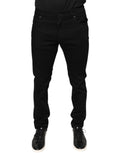 Jeans hommes skinny en coton stretch noir de Dolce & Gabbana, coupe ajustée et détails classiques.