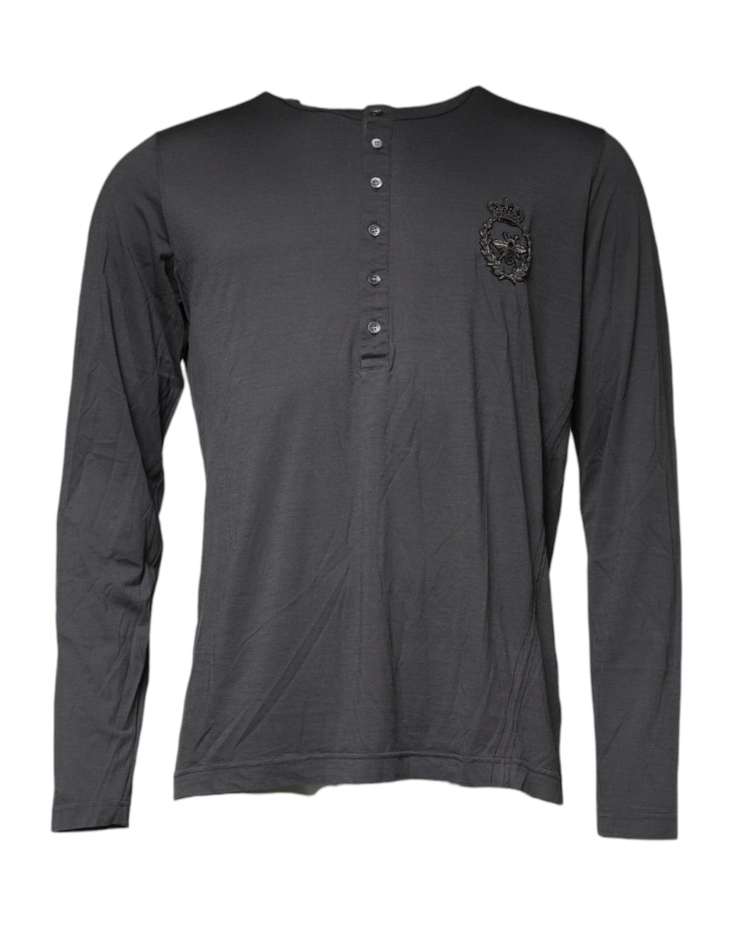 Pull en laine gris de Dolce & Gabbana avec broderie de couronne et abeille, détails élégants et motifs sophistiqués.