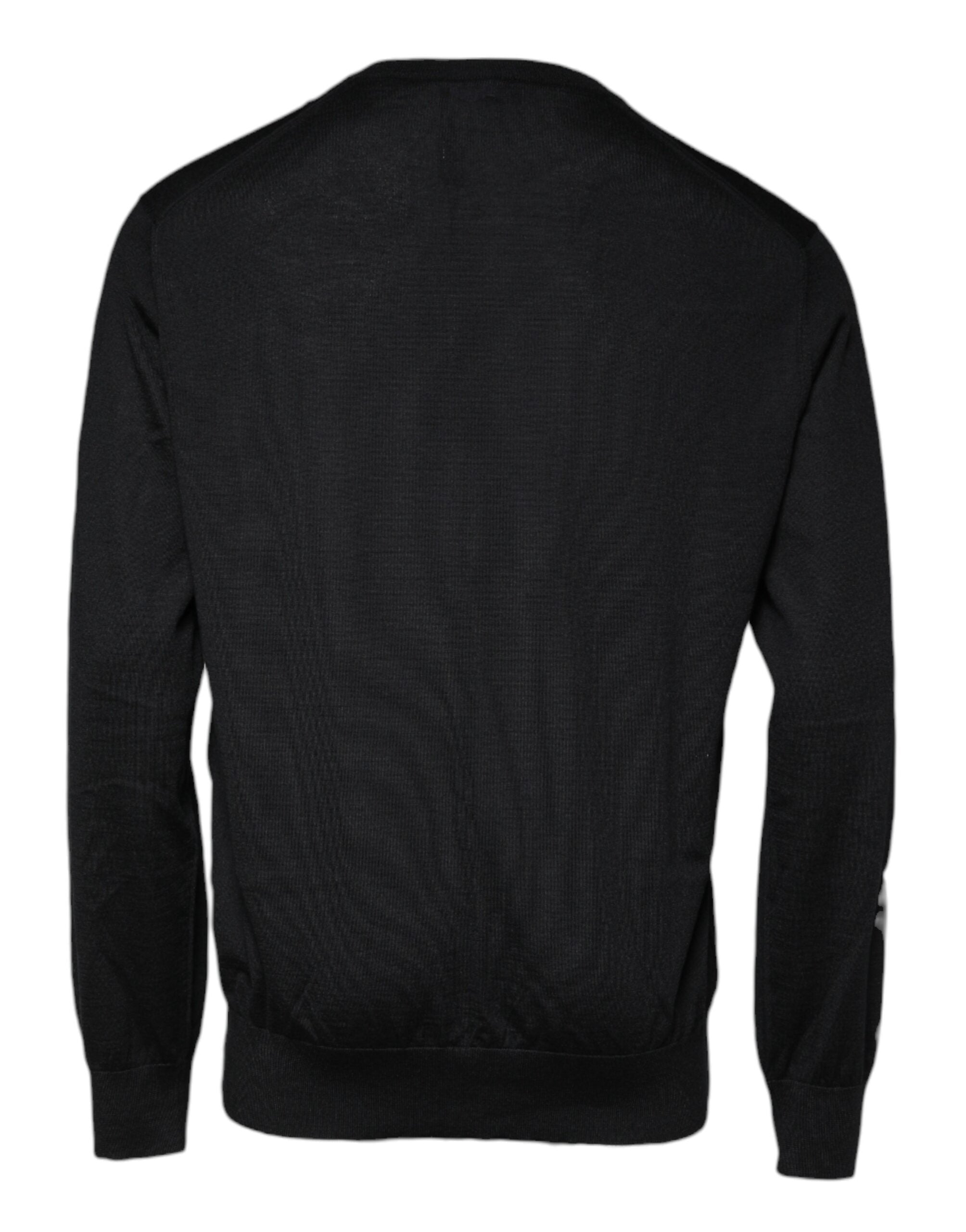 Pull-over en cachemire noir Dolce & Gabbana à col rond, doux et élégant, visible sur un mannequin.