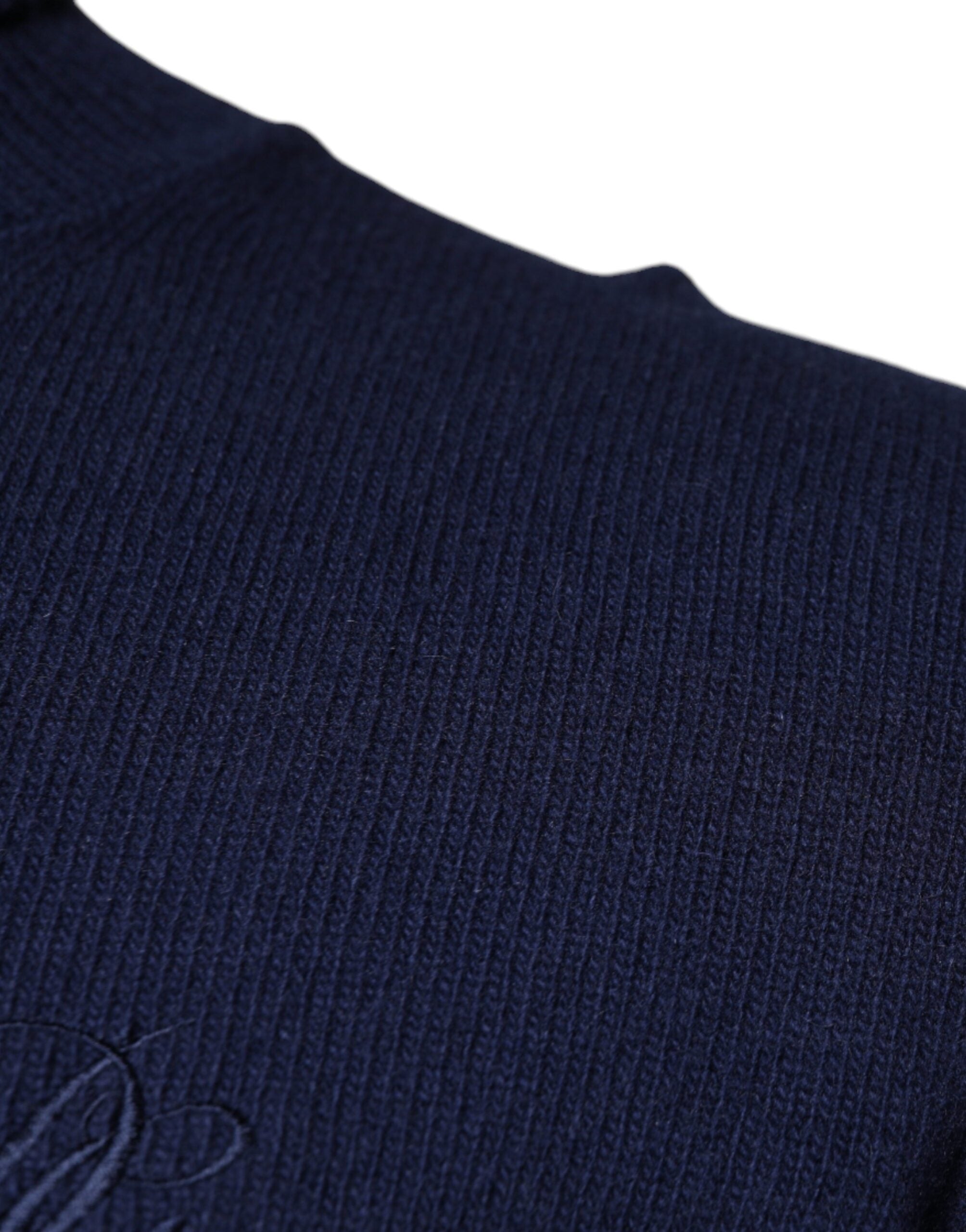 Pull en laine bleu Dolce & Gabbana à col roulé, pull-over élégant avec texture douce et coupe classique.