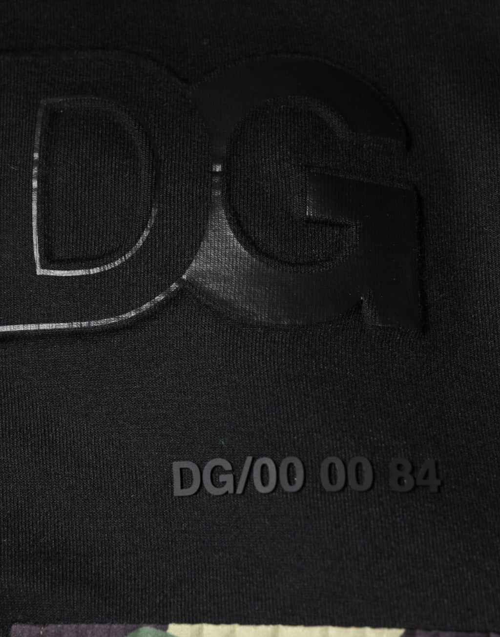 Sweat-shirt à capuche en coton noir Dolce & Gabbana avec poche, style décontracté et moderne.