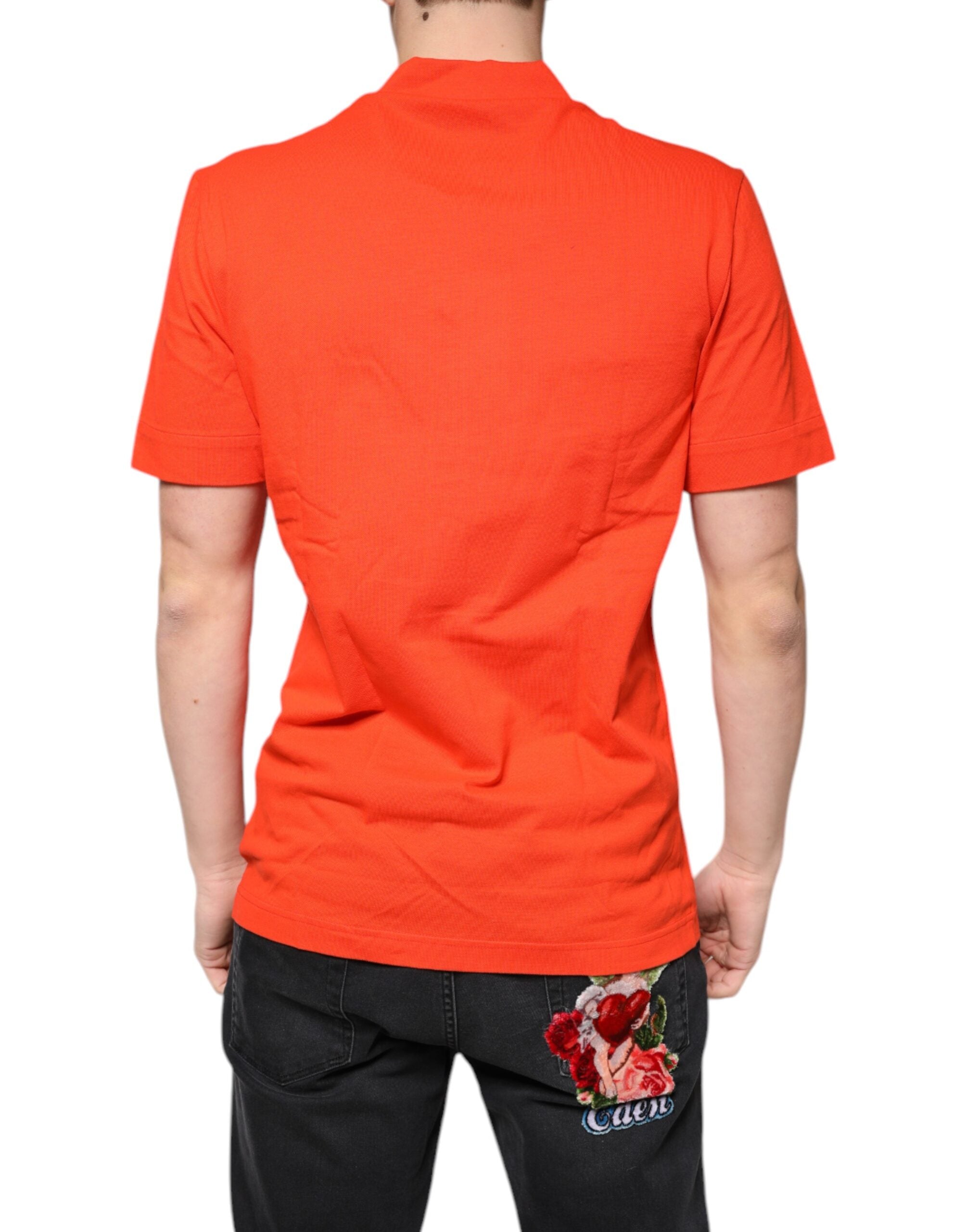 Chemise polo décontractée Dolce & Gabbana en coton orange avec boutons, vue de face.