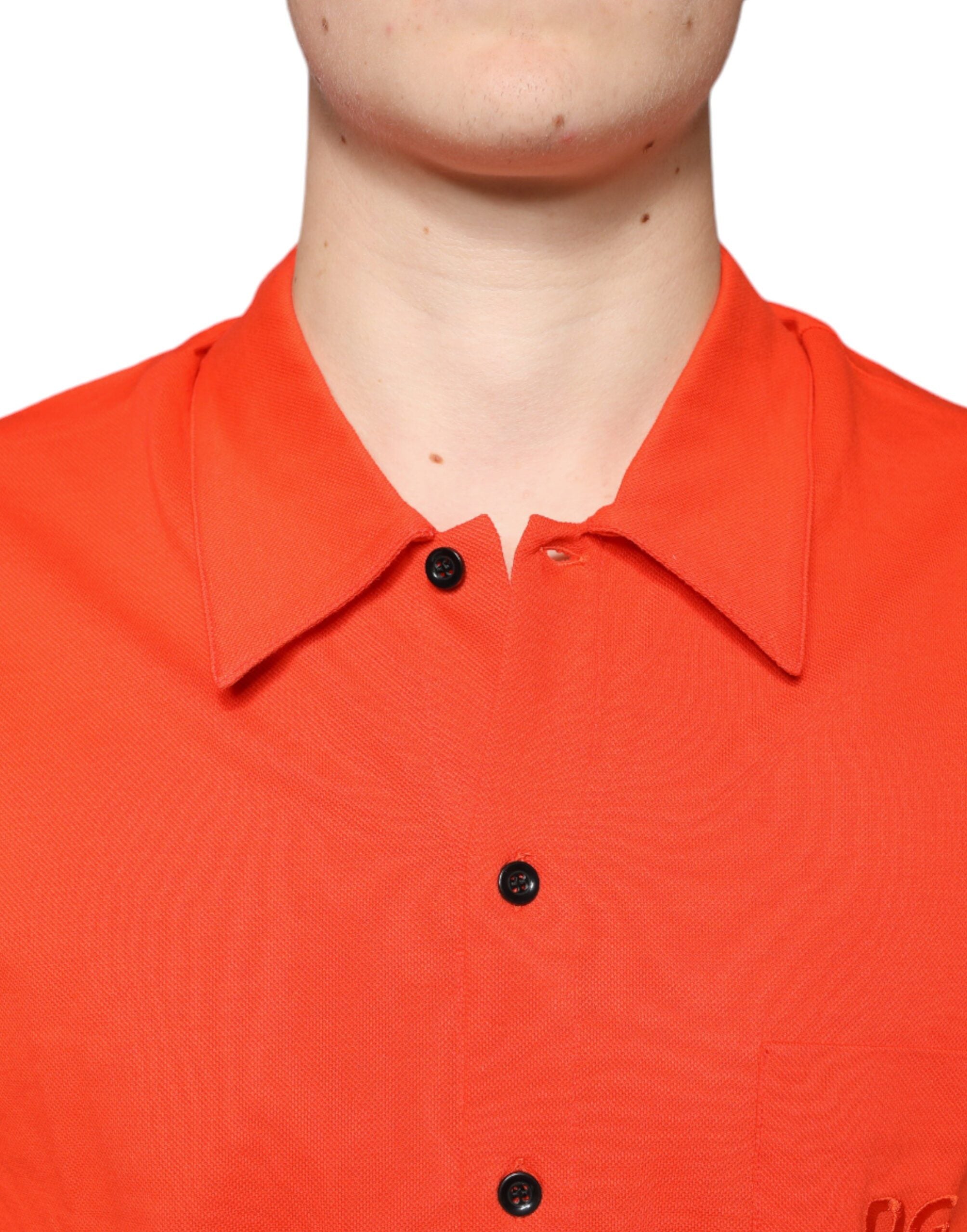 Chemise polo décontractée en coton orange de Dolce & Gabbana, boutonnière, style élégant et casual.